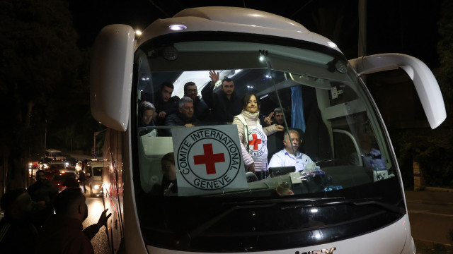 A bus of the Red Cross transferring released Palestinian prisoners from the Ofer Israeli military prison arrives in Ramallah, West Bank, 30 November 2023